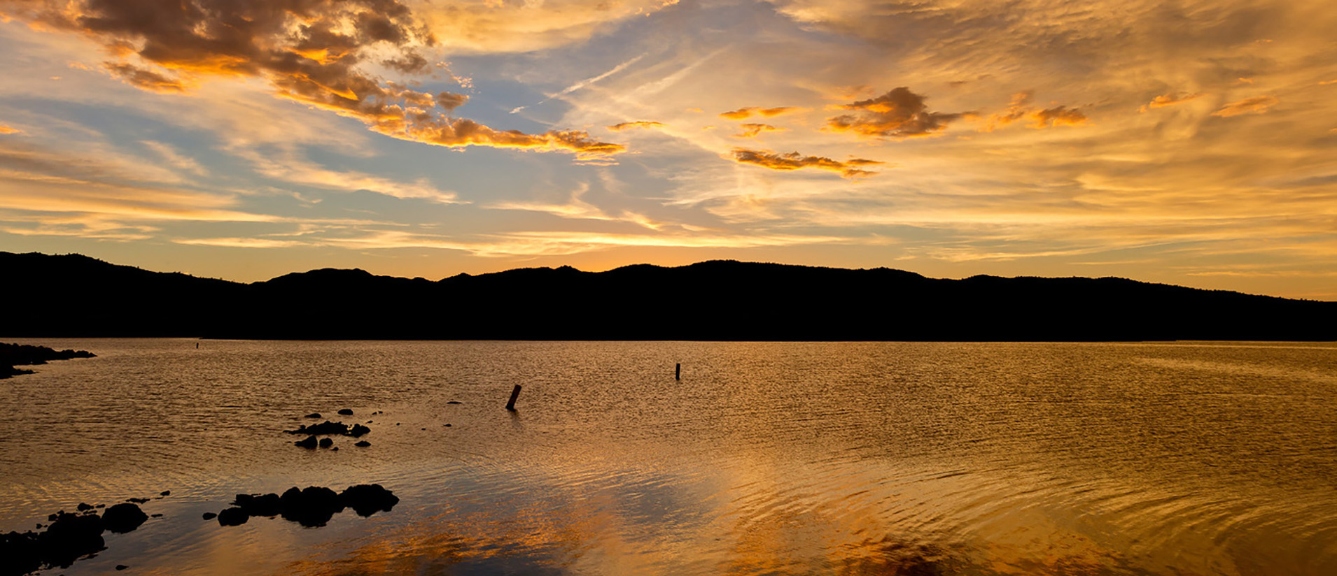 Sunset in bright orange over Alamo Lake