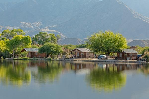 Cabins sit alongside the lake at Roper Lake State Park